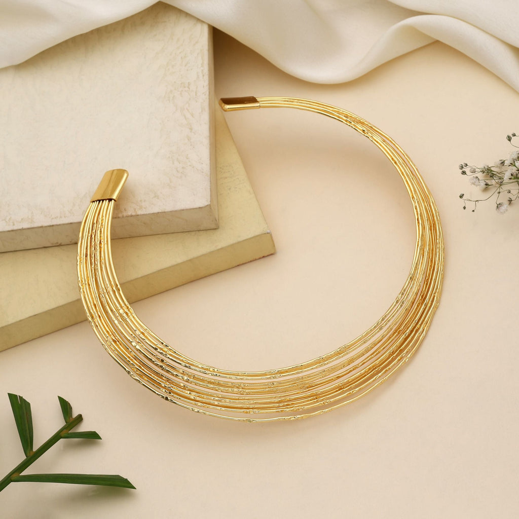 Stylish Gold Color Amrapali Hansli Necklace Designed To Enhance Classic Ethnic Necklace Styling Beautifully