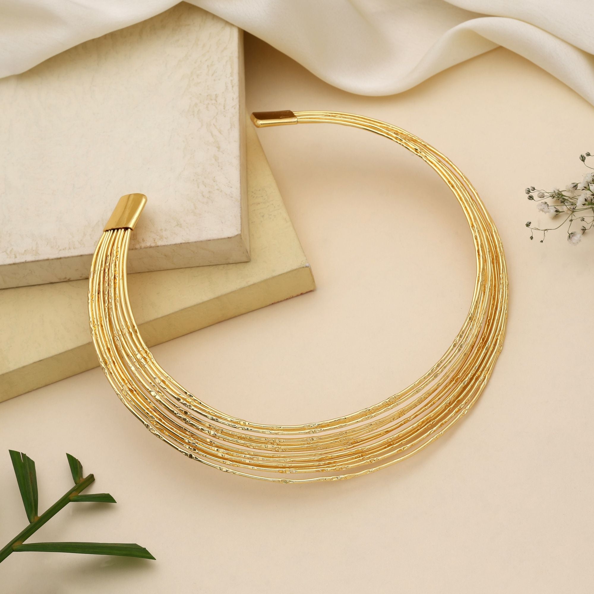 Stylish Gold Color Amrapali Hansli Necklace Designed To Enhance Classic Ethnic Necklace Styling Beautifully