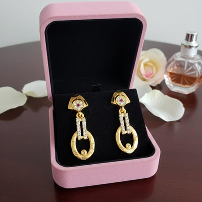 Gold Color Antique Earrings With Ornate Patterns Inspired By Temple Jewelry