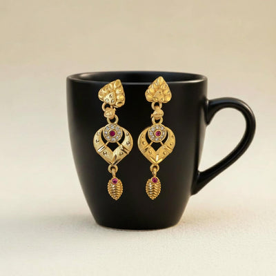Gold Color Antique Earrings Highlighting Intricate Patterns And Heritage Craftsmanship