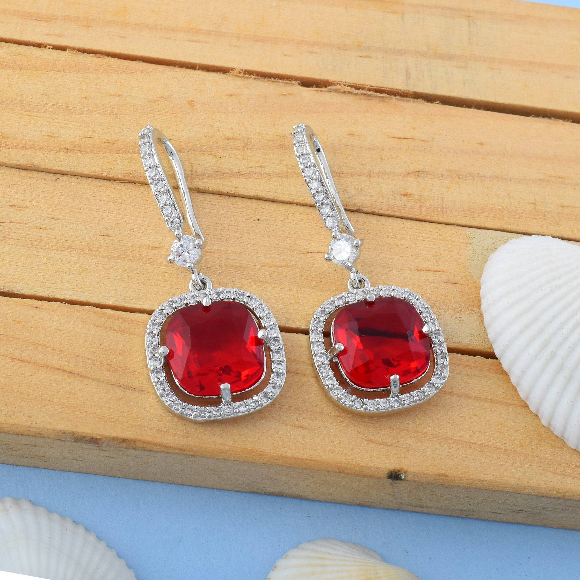 Red Color American Diamond Earrings In Twisted Loop Inspired Statement Design