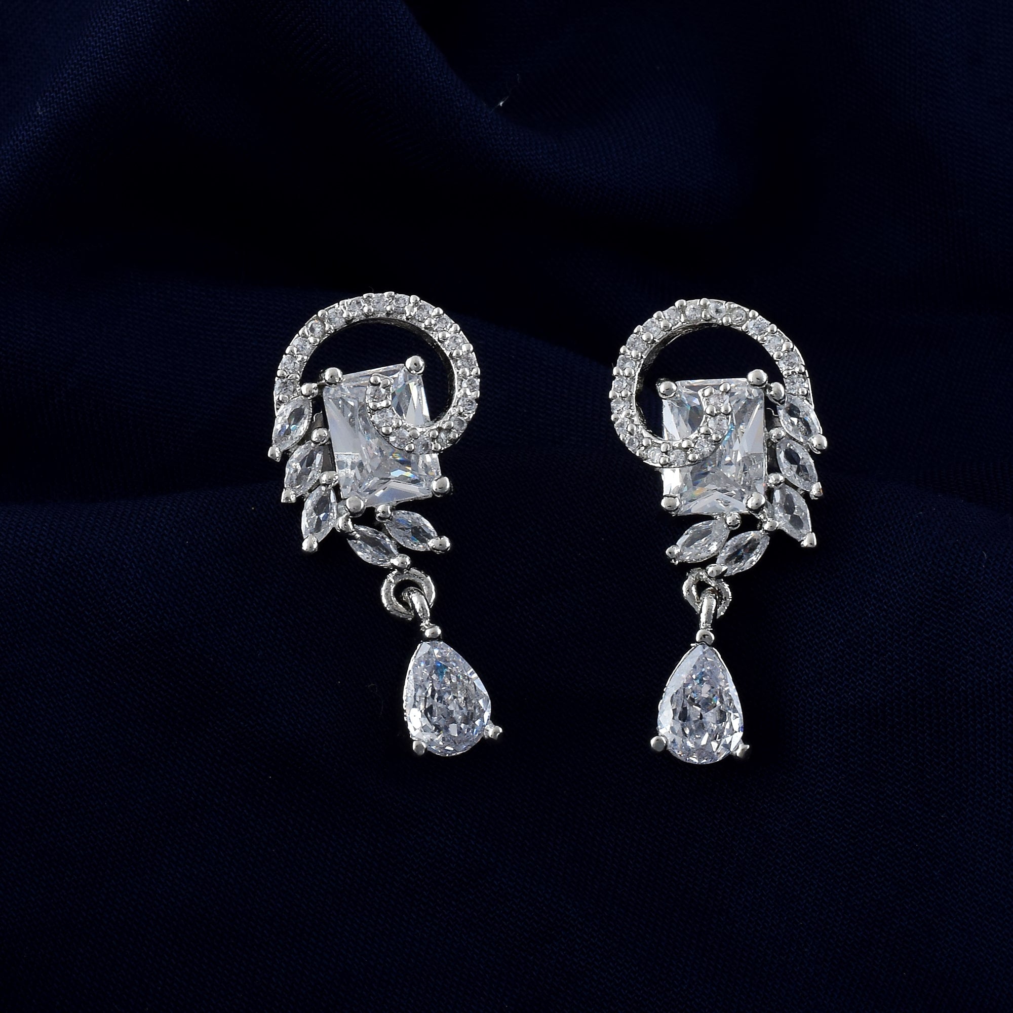 Silver Color American Diamond Earrings With Twinkle Round Dangling Gem Look