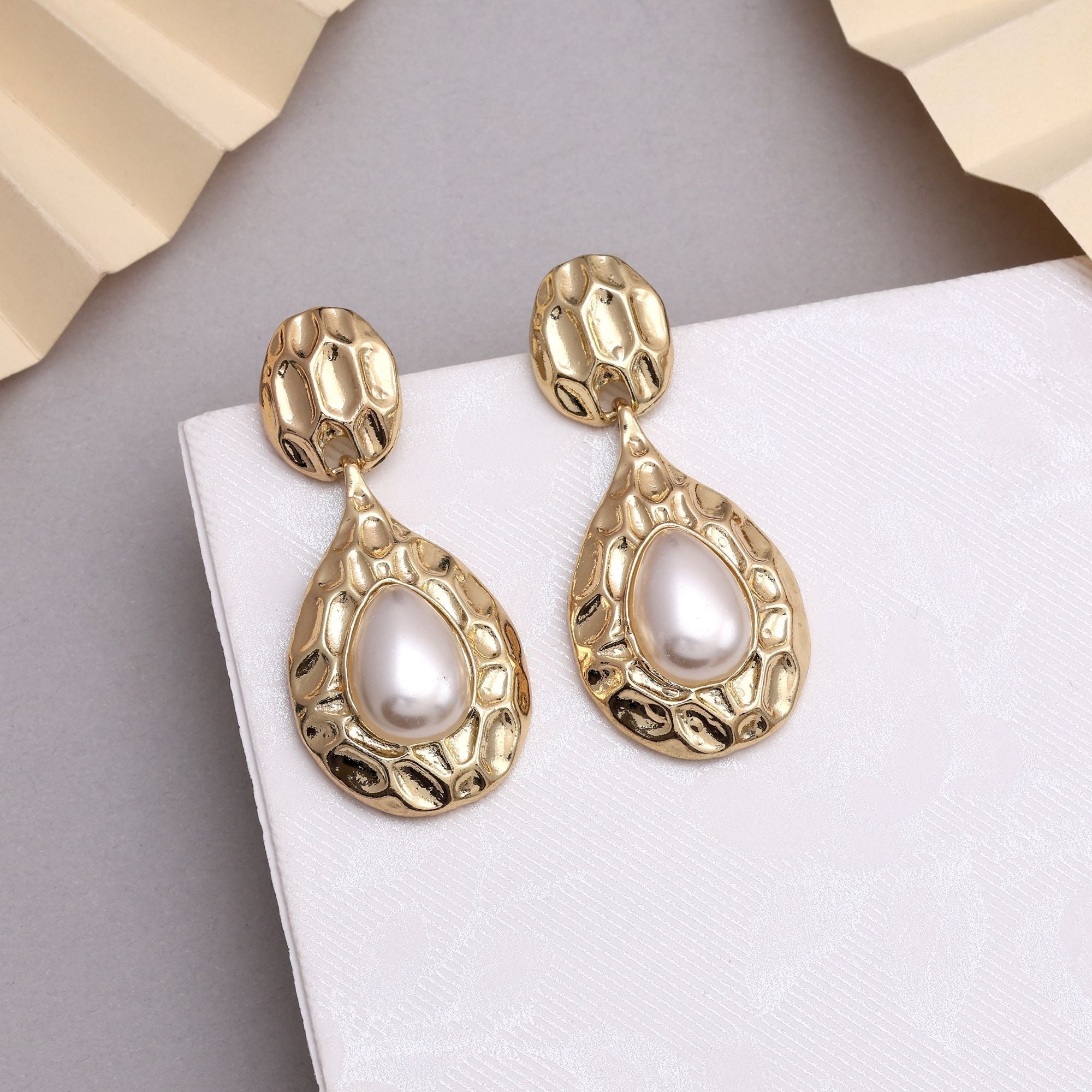 Beautiful White Color Anti Tarnish Earrings With Stone Studded Look For Festive Events