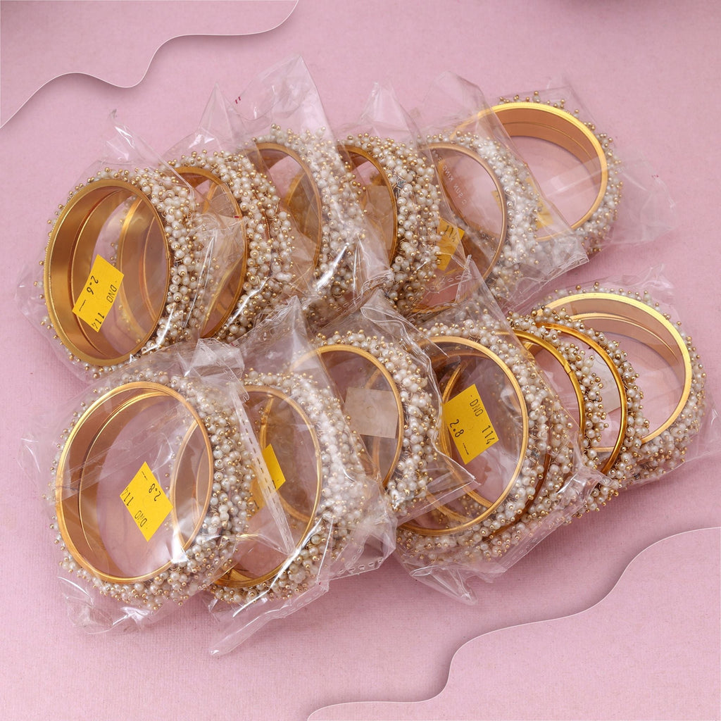 Luxurious Gold Color 12 Set Of Bangles Combo Ideal For Bridal And Ethnic Occasions