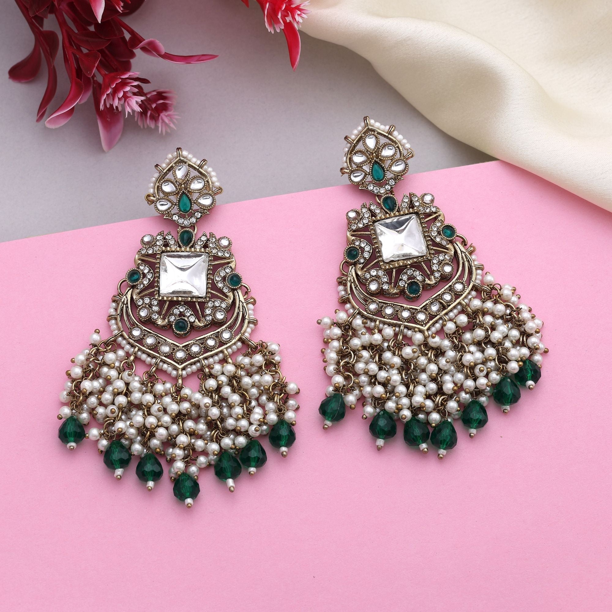Stylish Green Color Kundan Earrings With Gold Plated Finish For Festive Looks