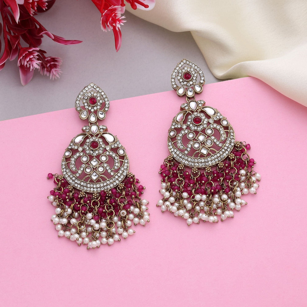 Elegant Rani Color Kundan Earrings With Handcrafted Design For Festive Events
