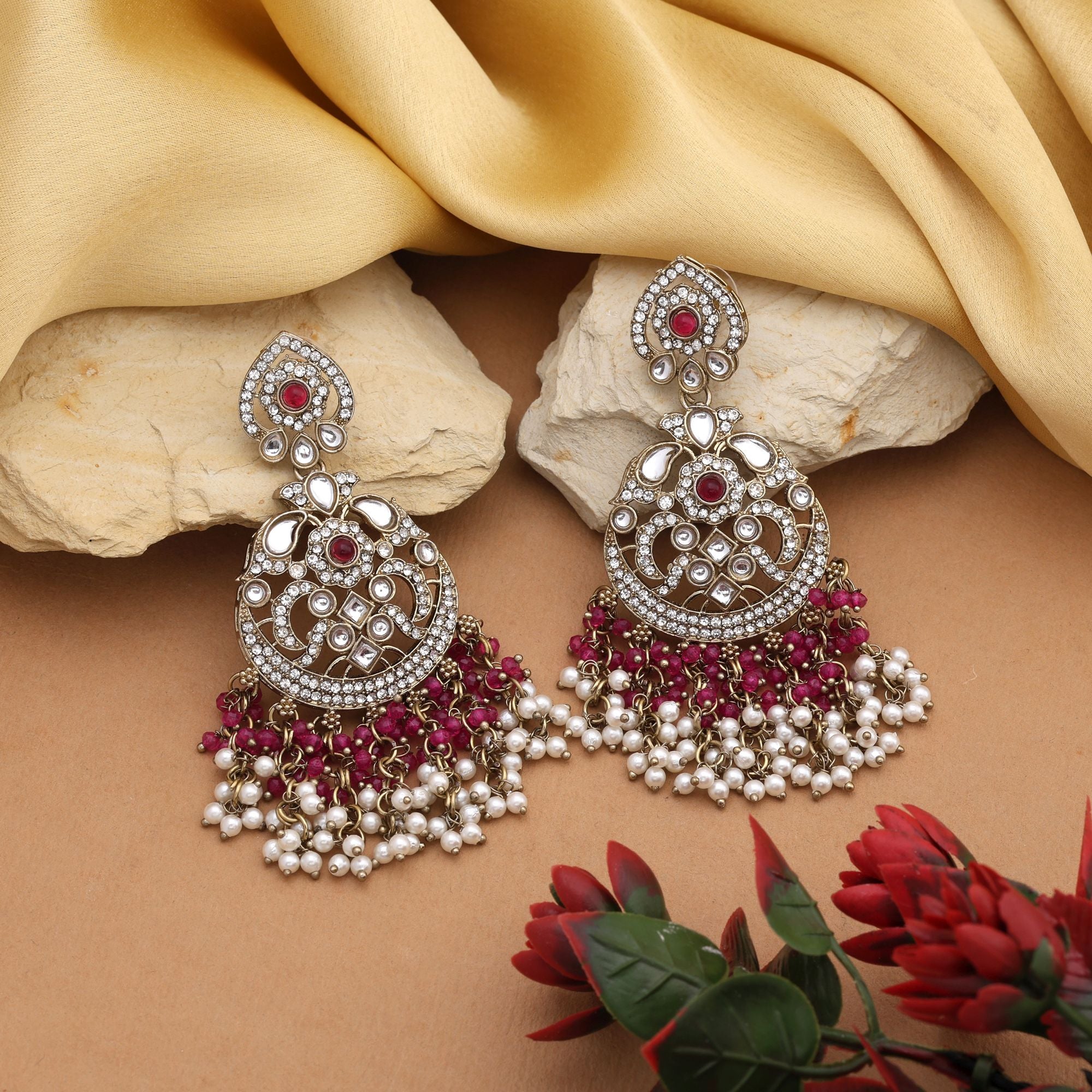 Elegant Rani Color Kundan Earrings With Handcrafted Design For Festive Events