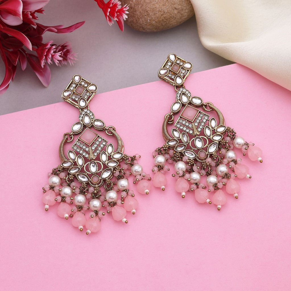 Stylish Pink Color Kundan Earrings With Gold Touch Perfect For Traditional Functions
