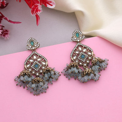 Beautiful Firozi Color Kundan Earrings With Sparkling Stones Perfect For Bridal Wear