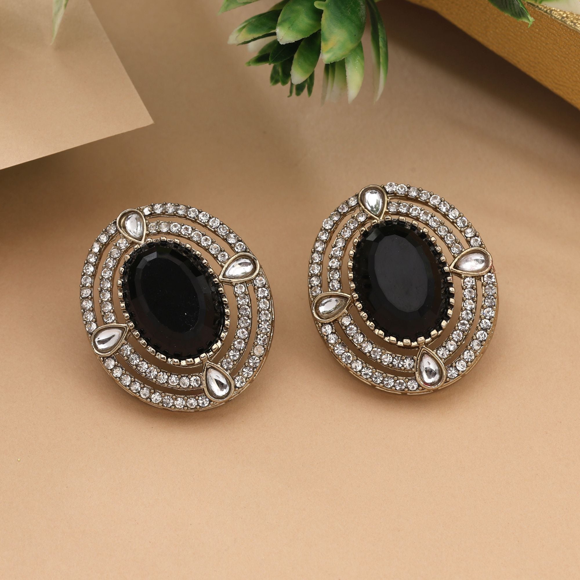 Trendy Black Color Stud Kundan Earrings For Festive And Modern Look