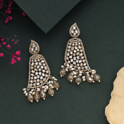 Shimmering Gold Color Kundan Earrings With Exquisite Craftsmanship And Finish