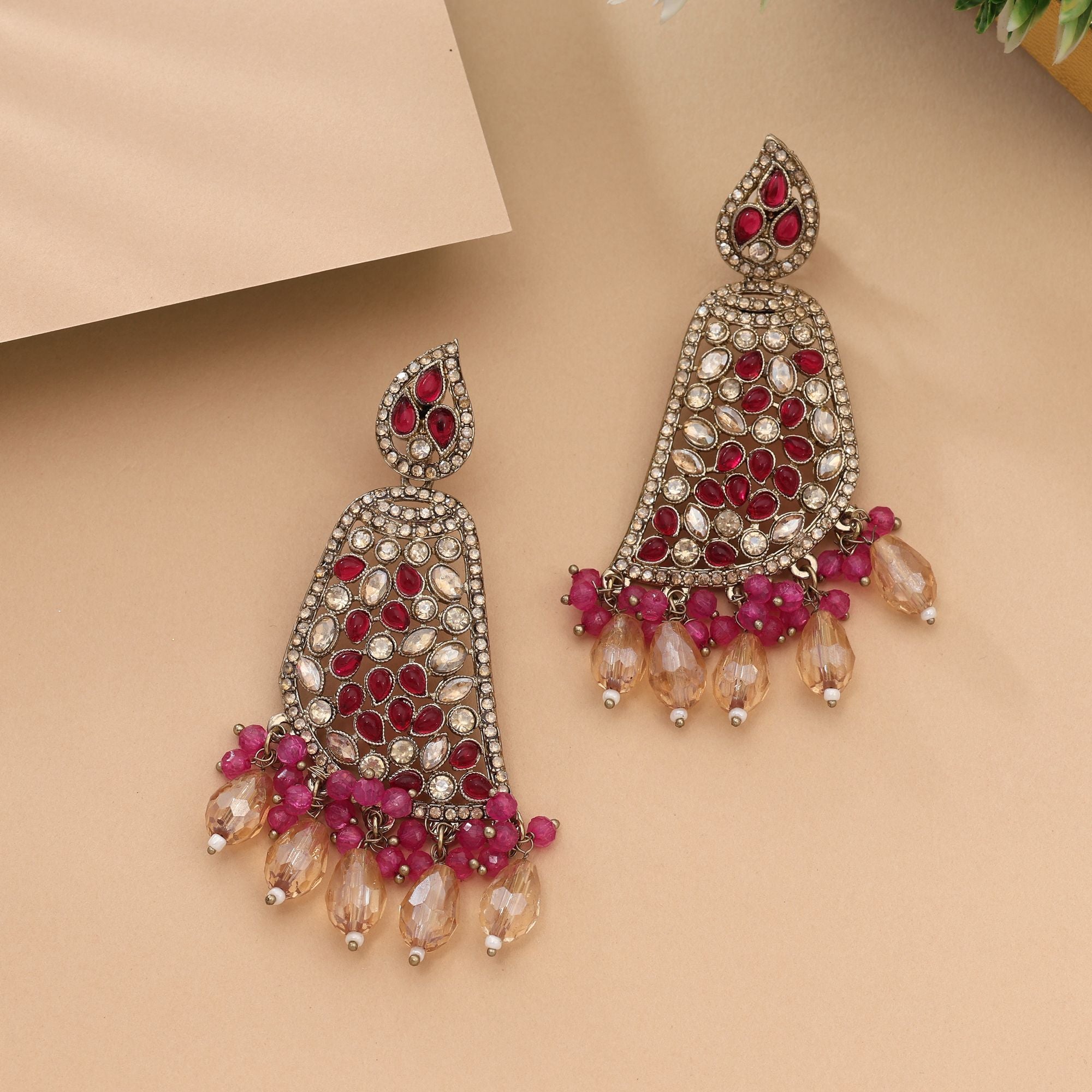 Attractive Rani Color Kundan Earrings Perfect For Bridal And Party Styling