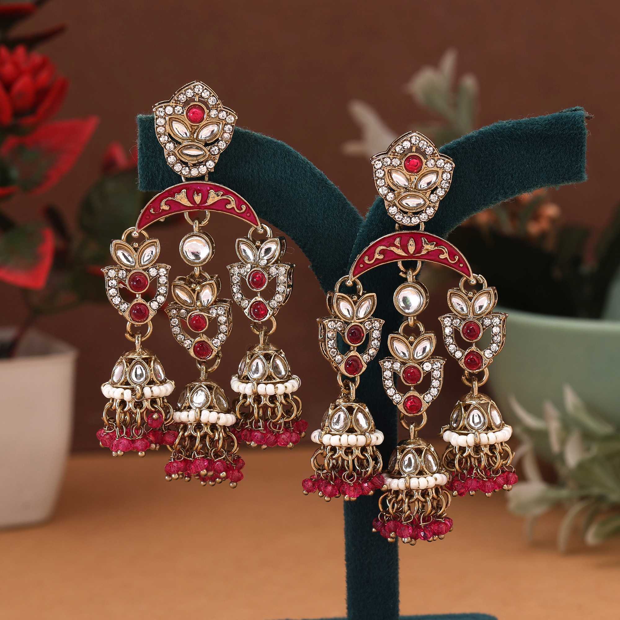 Rani Color Kundan Earrings Designed With Beautiful Bright Stones For Festive Occasions