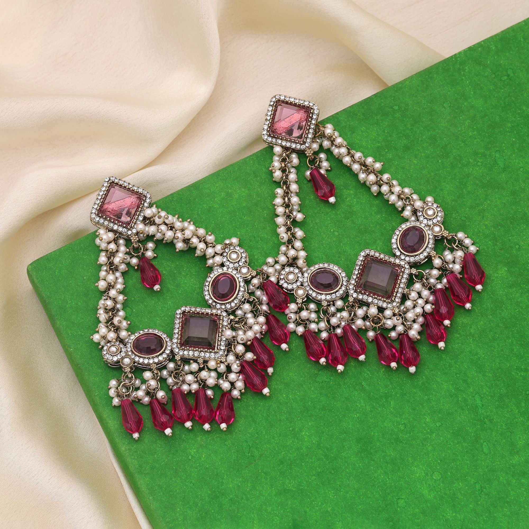Rani Color Kundan Earrings Crafted For Royal Bridal And Party Looks