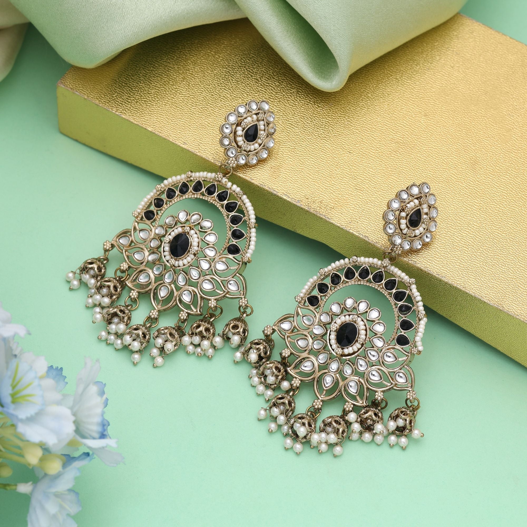 Black Color Kundan Earrings Featuring Premium Finish And Bold Style