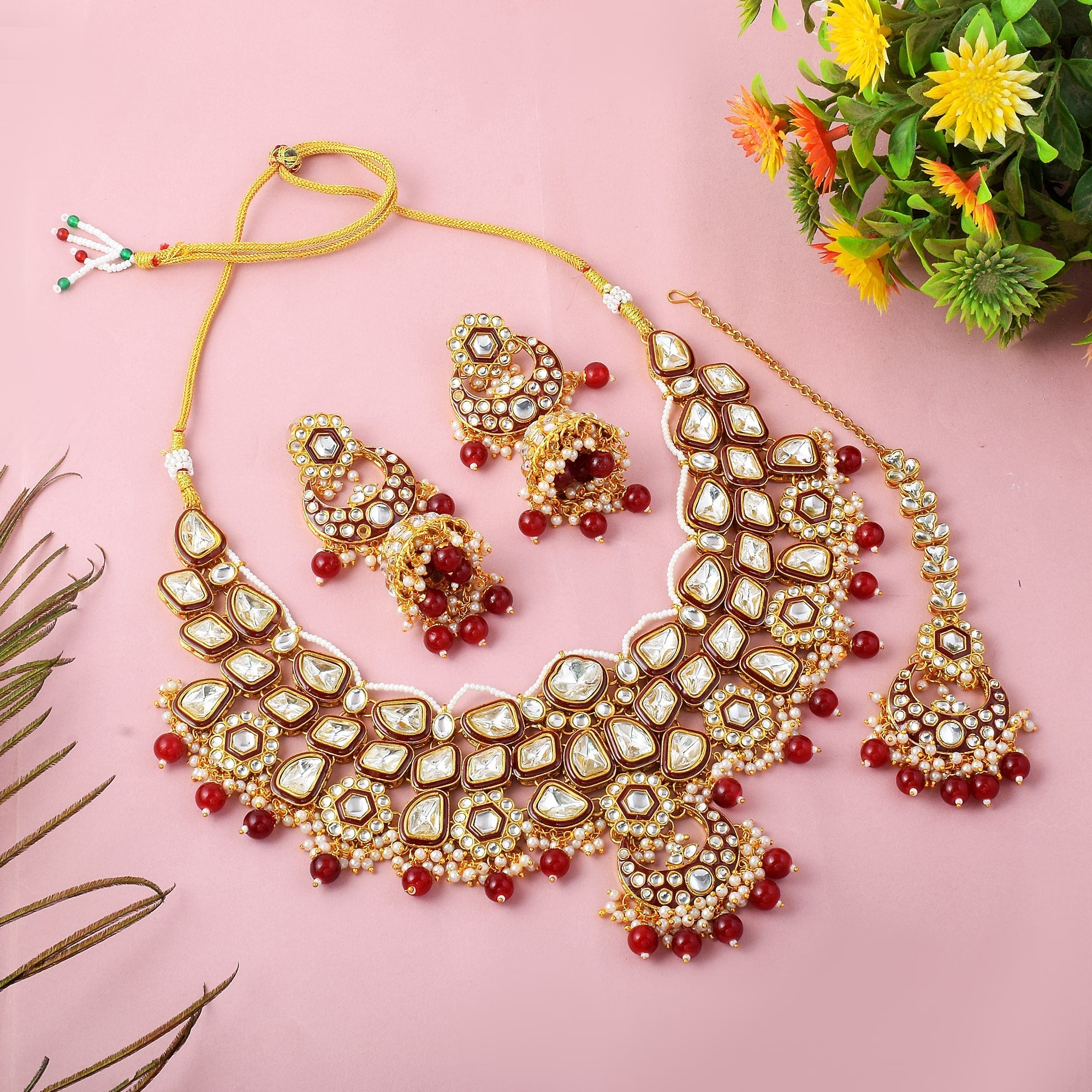 Beautiful Maroon Color Kundan Necklace Set With Elegant Gold Accents
