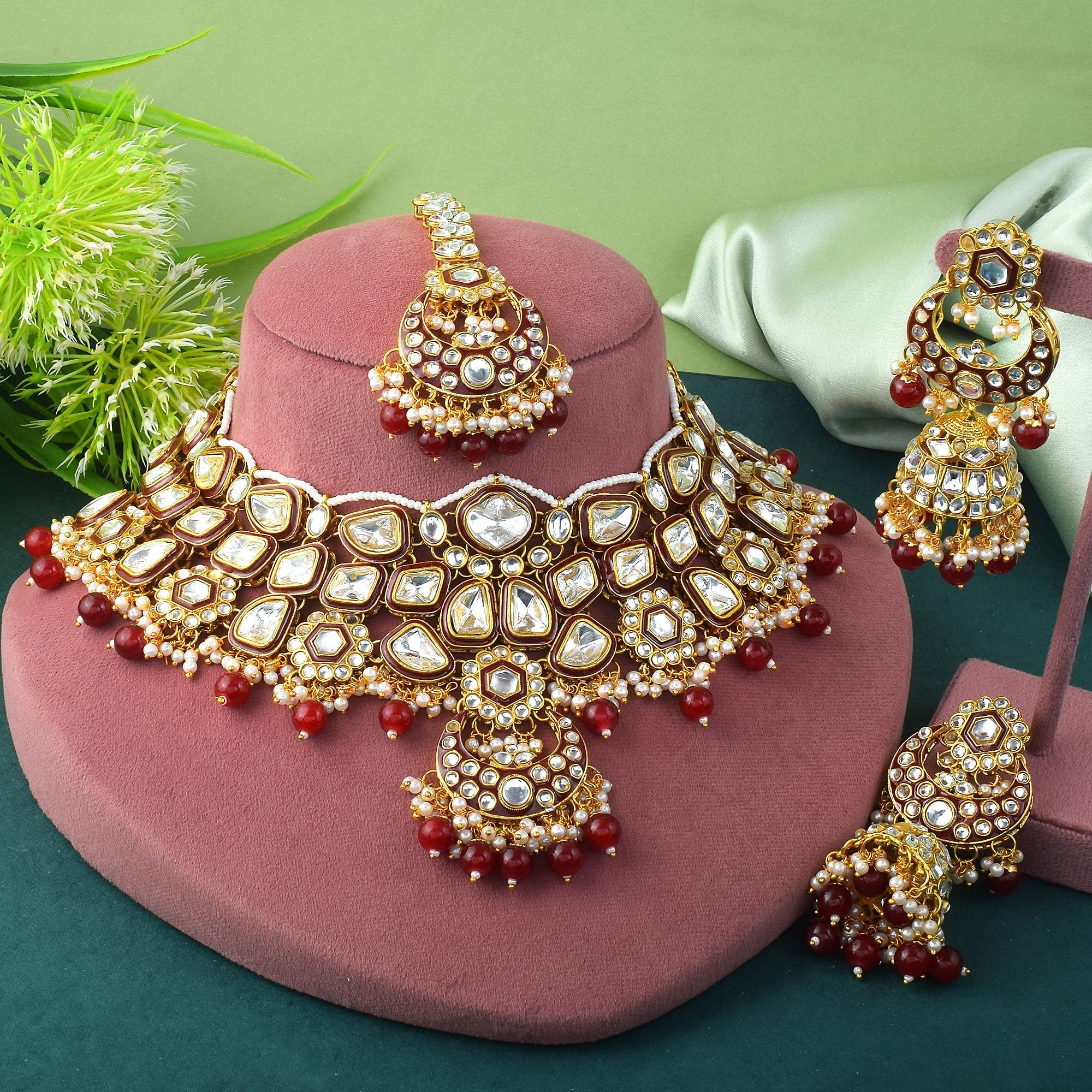 Beautiful Maroon Color Kundan Necklace Set With Elegant Gold Accents