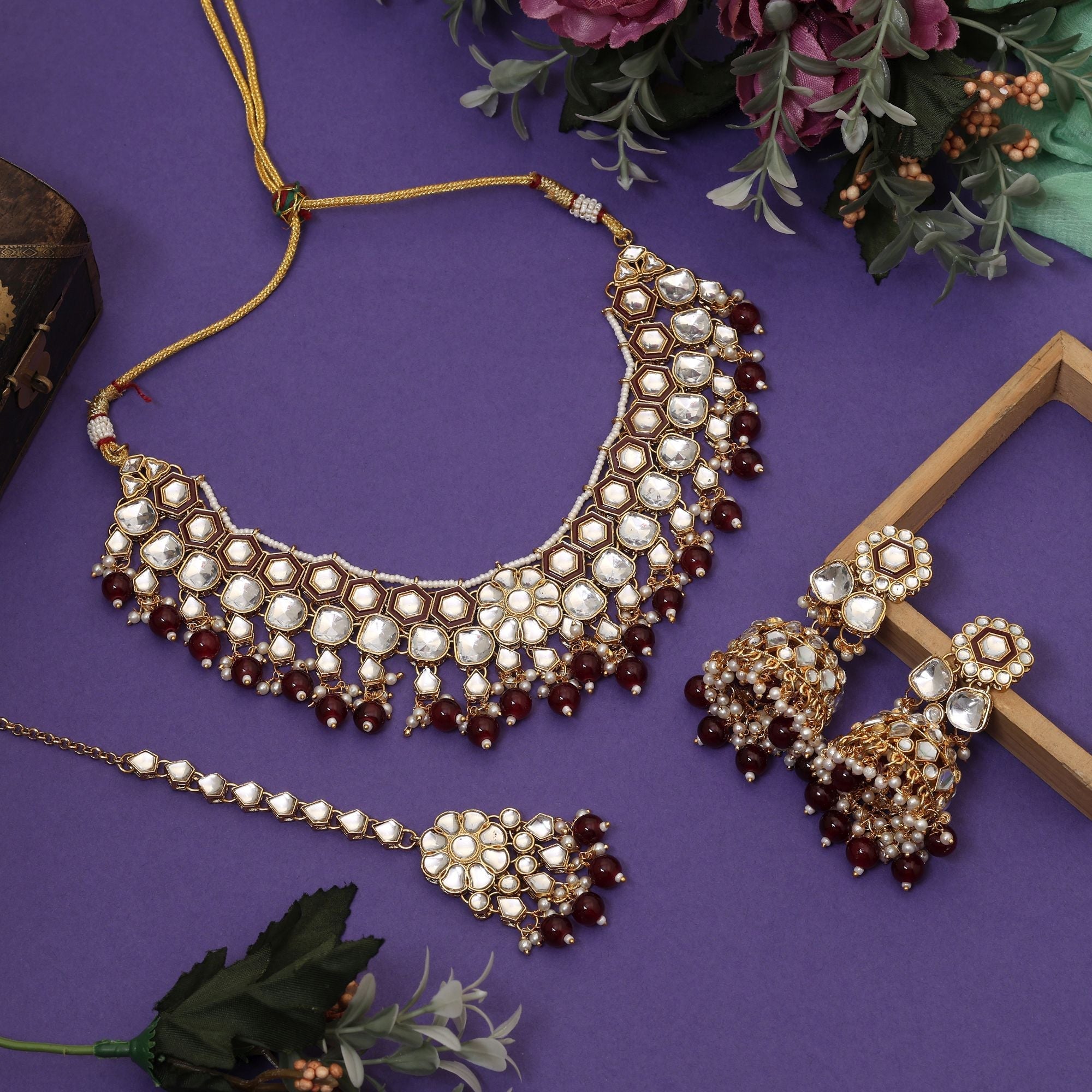 Elegant Maroon Color Meena Work Kundan Necklace Set Designed For Weddings And Traditional Celebrations
