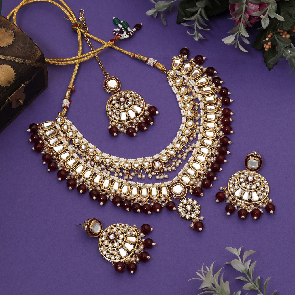 Royal Maroon Color Meena Work Kundan Necklace Set Crafted With Premium Detailing For Wedding Celebrations