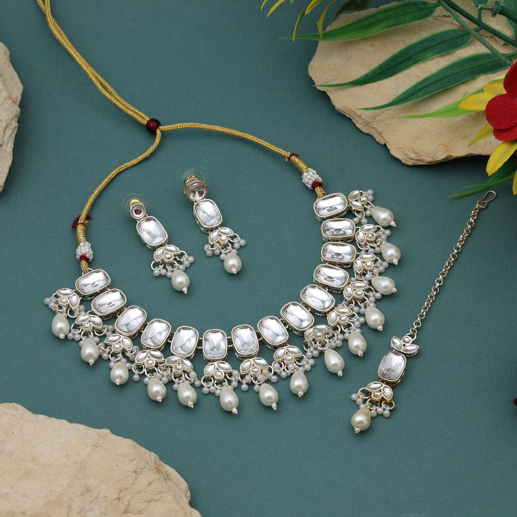 Royal White Color Kundan Necklace Set Crafted With Stunning Detailing And Antique Finish