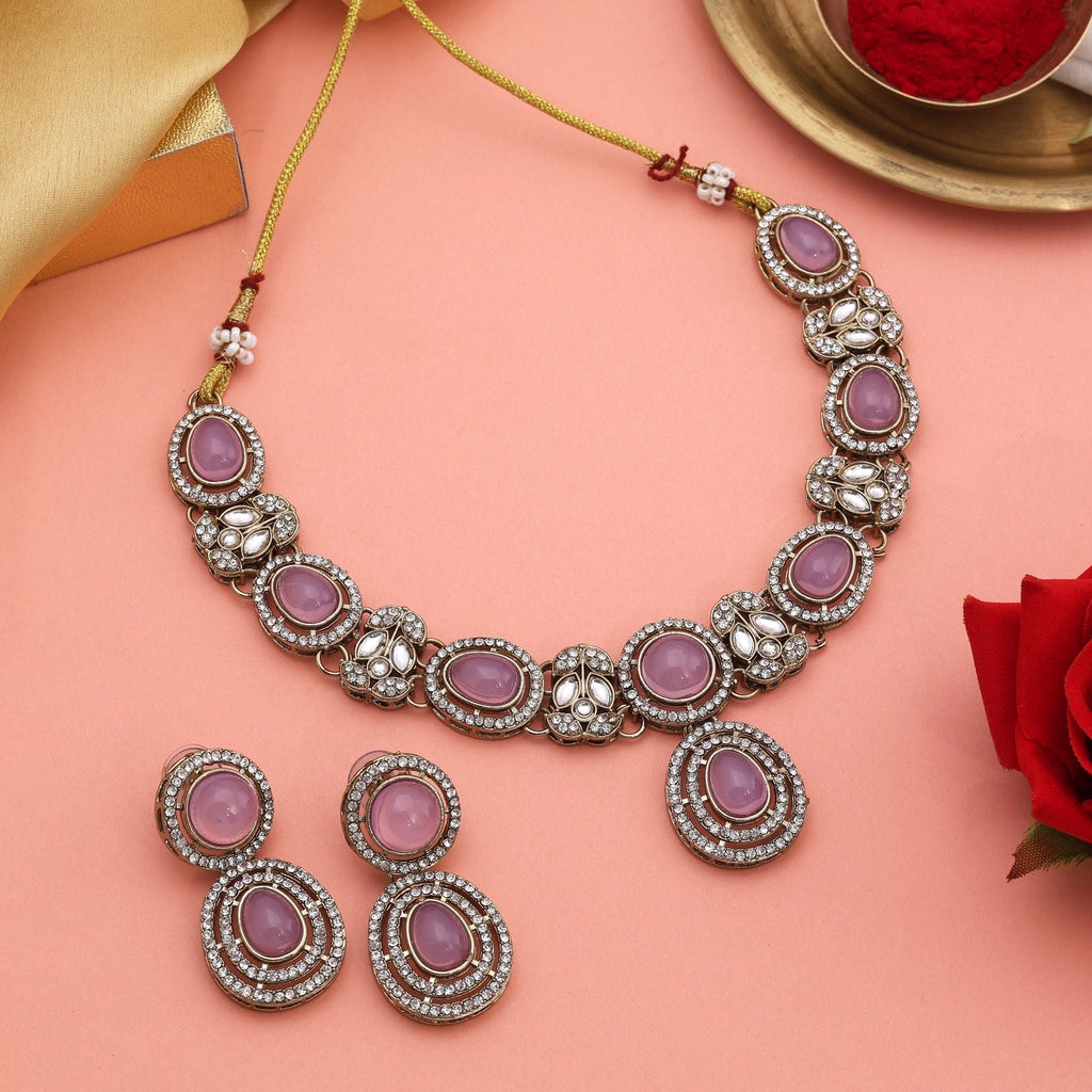 Trendy Pink Color Kundan Necklace Set With Golden Detailing For Elegant Wear