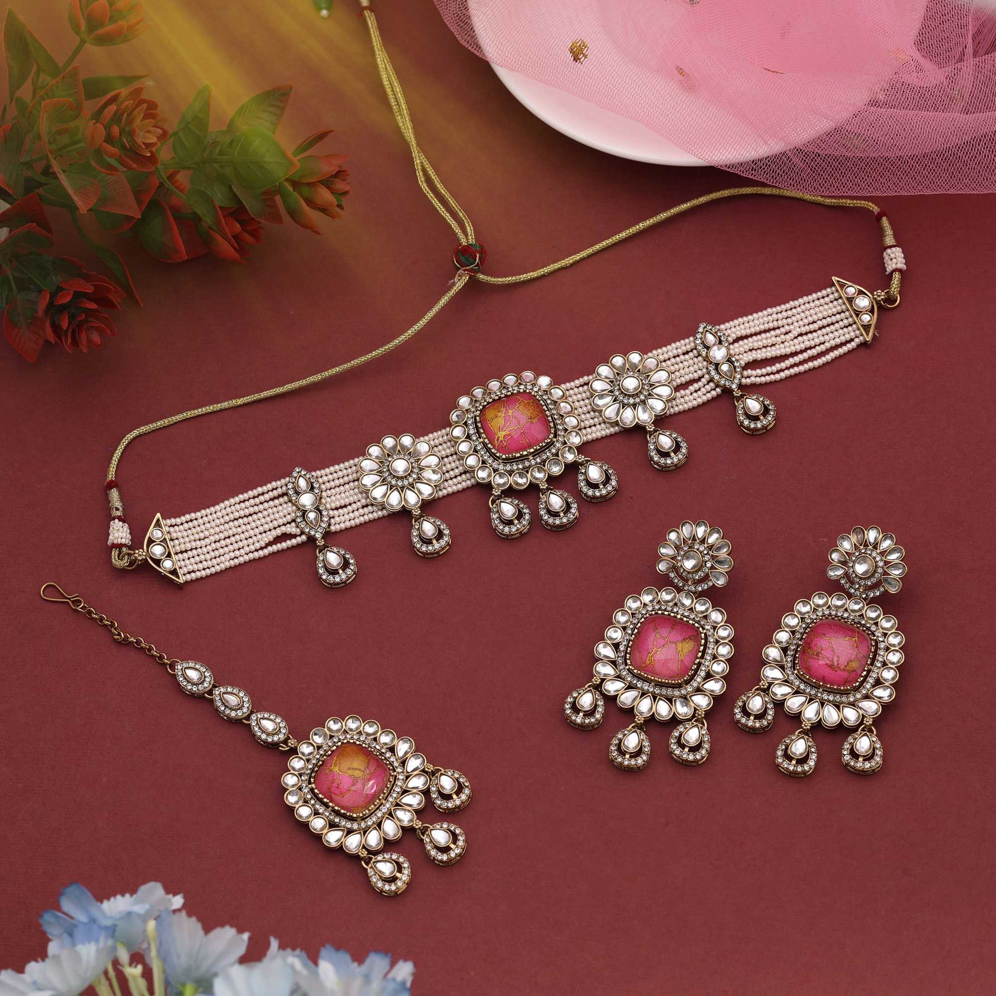 Stunning Rani Color Choker Kundan Necklace Set Offering A Royal And Graceful Appearance