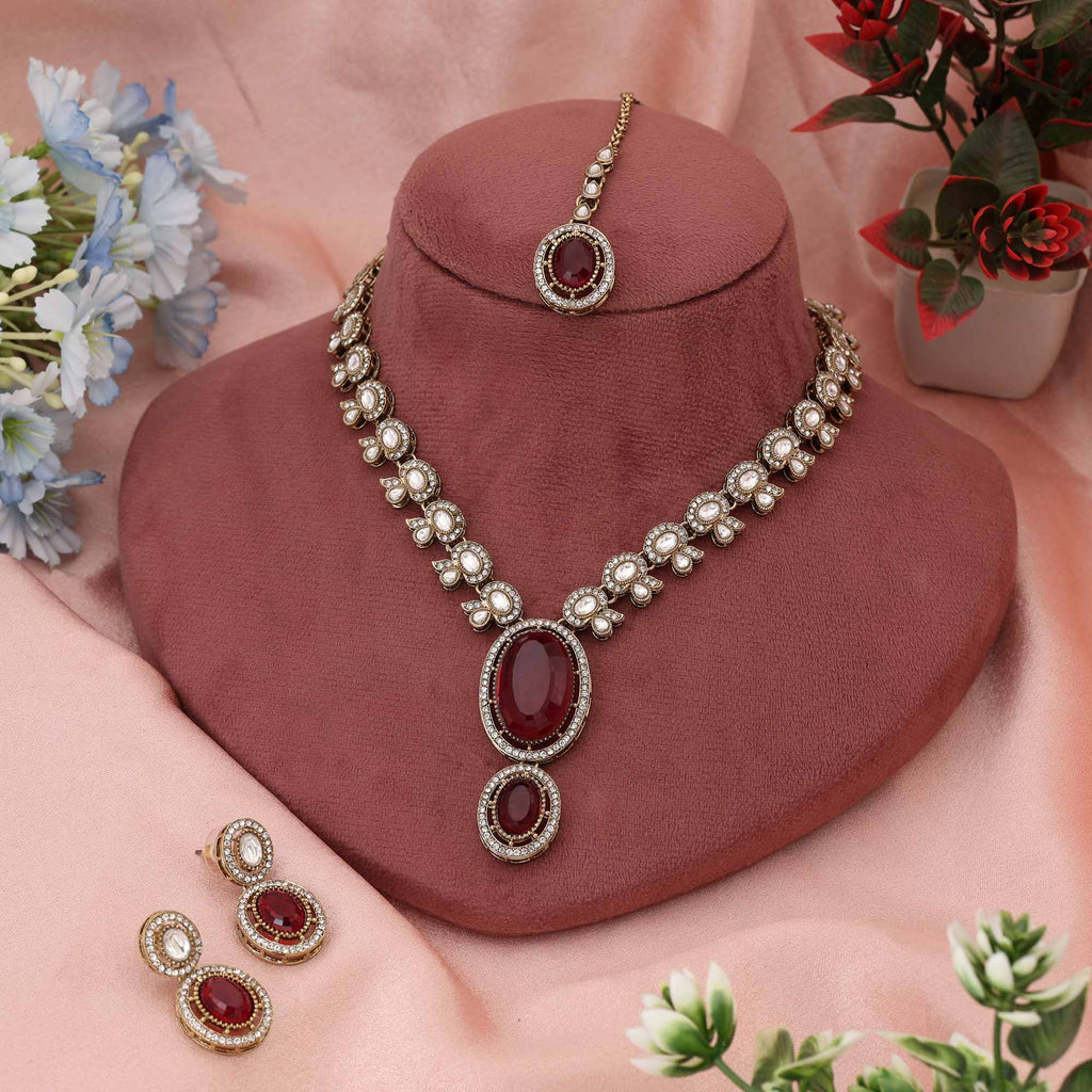 Radiant Rani Color Kundan Necklace Set Offering Bold Beauty For Cultural Celebrations