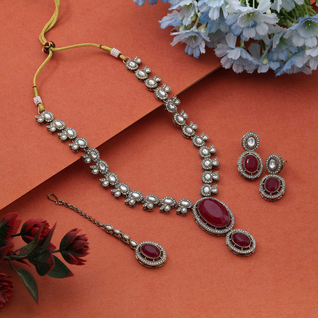 Radiant Rani Color Kundan Necklace Set Offering Bold Beauty For Cultural Celebrations