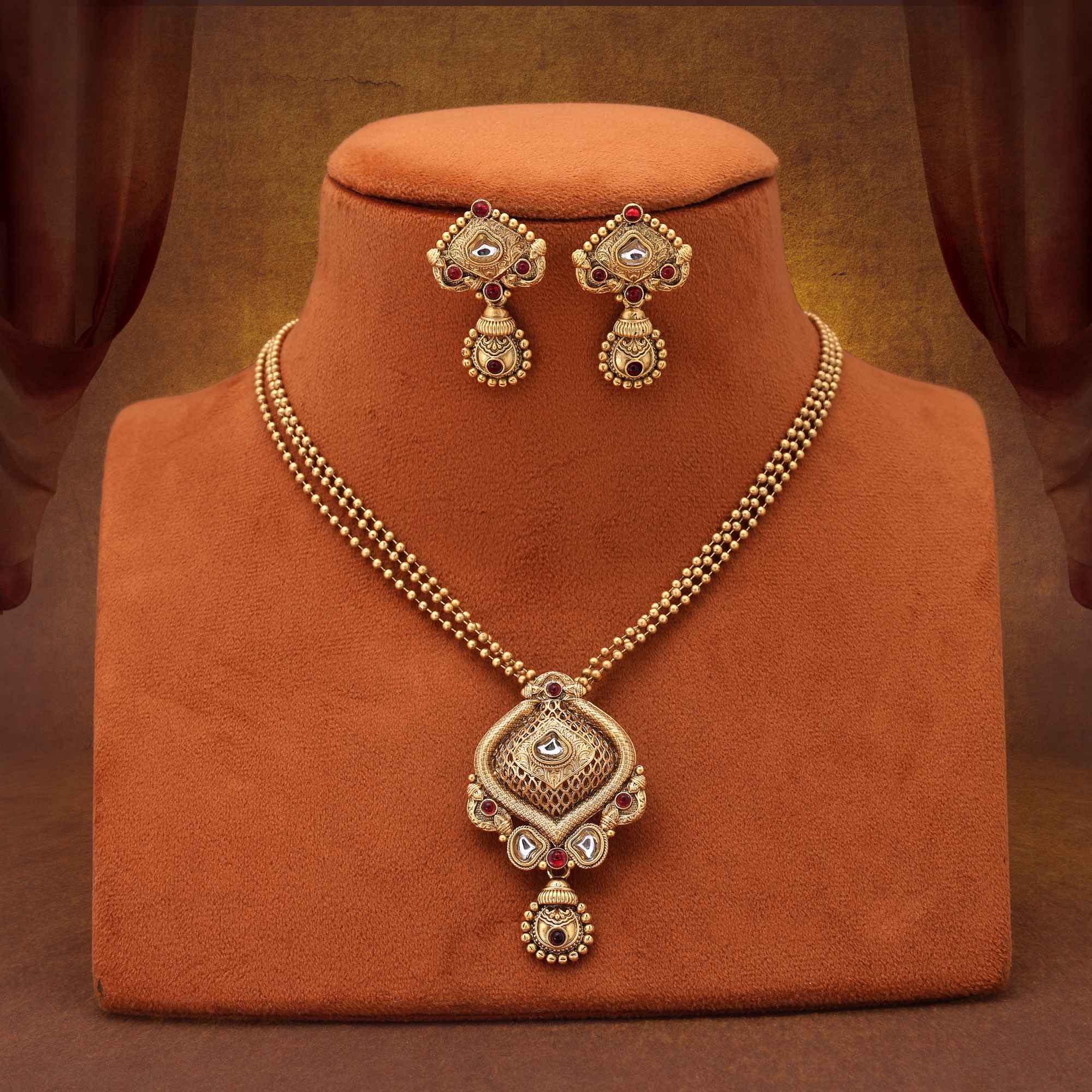 Stylish Rani Color Matte Gold Necklace Set With Stone Embellished Design