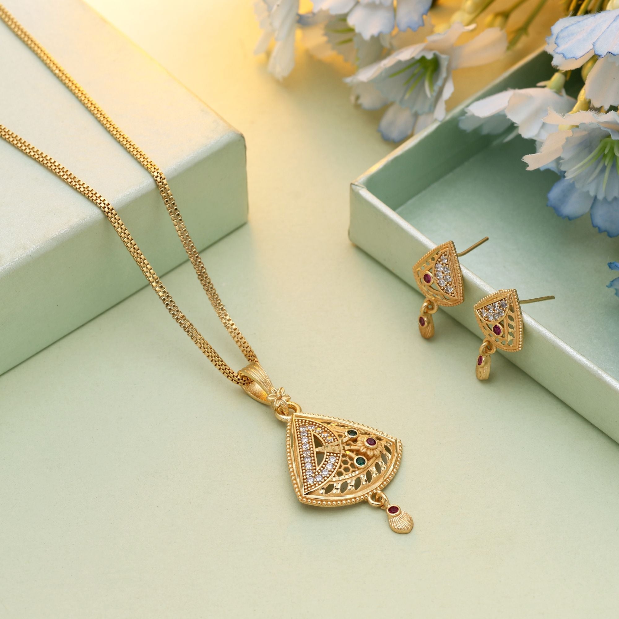 Gold Color Chain Pendant With Earring Suitable For Festive Wear And Special Occasions