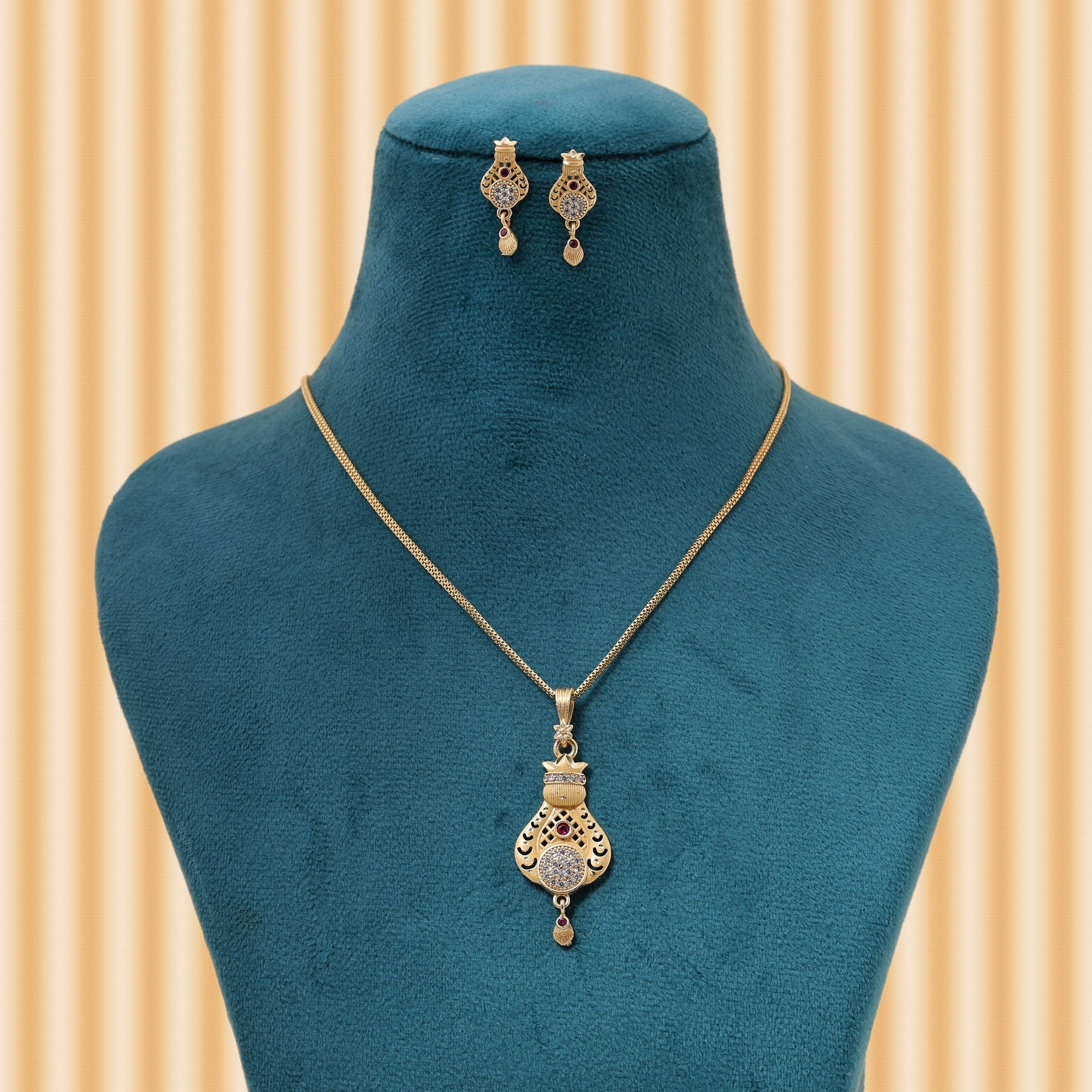 Gold Color Chain Pendant With Earring Crafted For Refined Ethnic And Contemporary Styling
