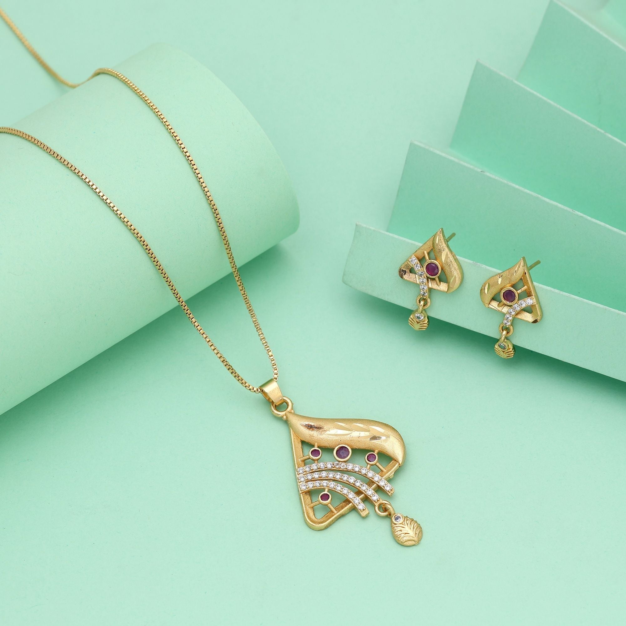 Gold Color Chain Pendant With Earring Showcasing Elegant Form For Timeless Jewelry Lovers