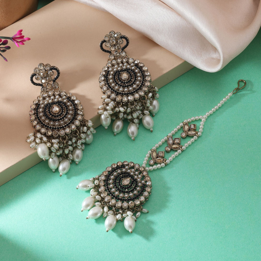Classy Black Color Kundan Earrings Tikka Set For Party And Festive Wear