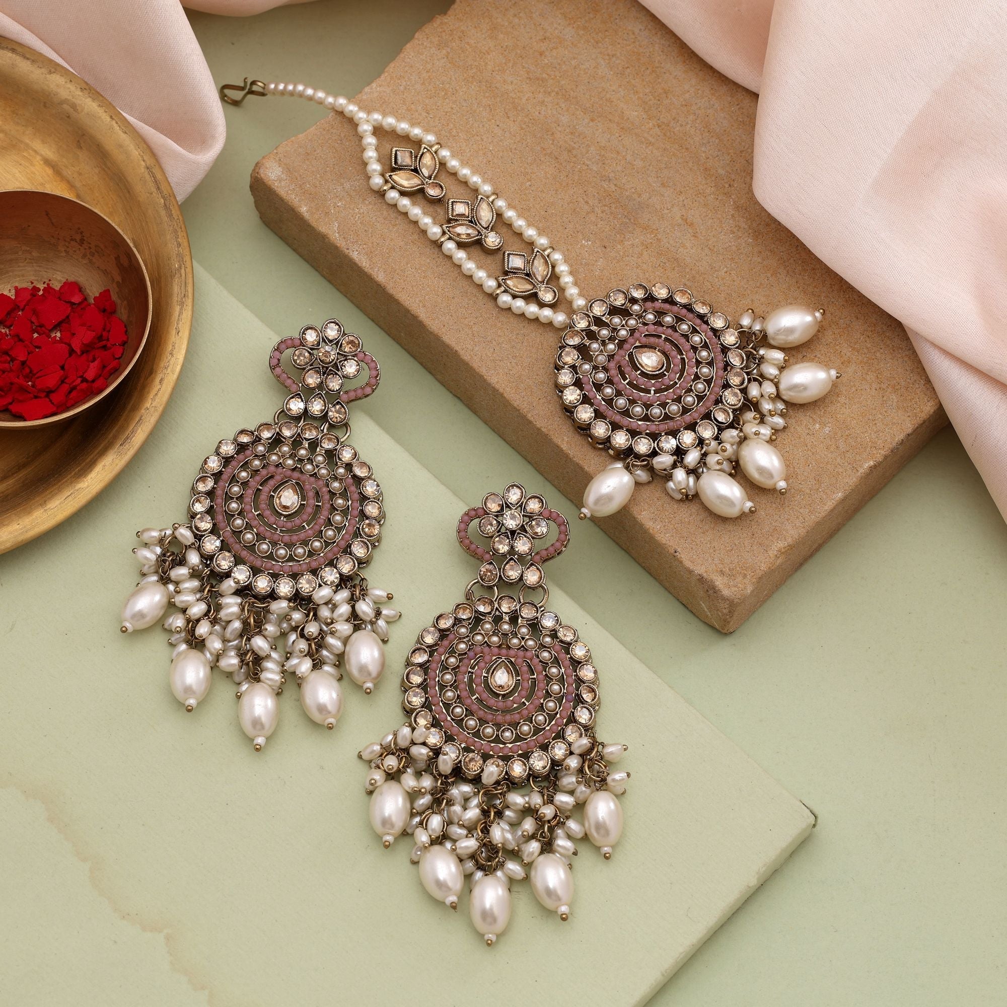 Gorgeous Pink Color Kundan Earrings Tikka Set With Intricate Detailing For Women