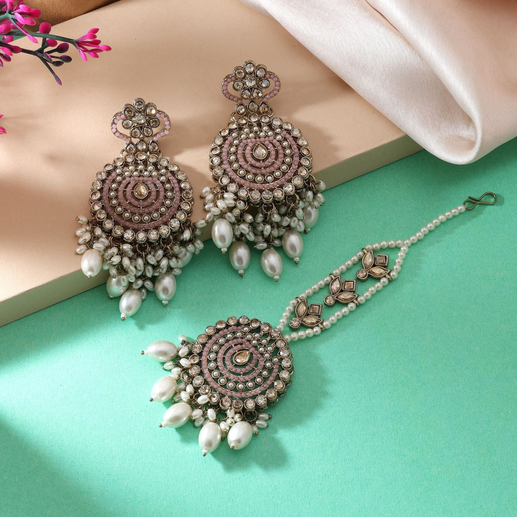 Gorgeous Pink Color Kundan Earrings Tikka Set With Intricate Detailing For Women