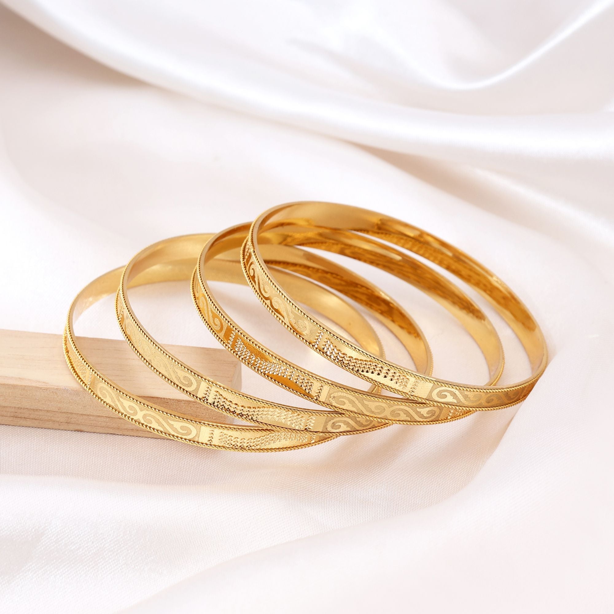 Gold Color 1 Set Of Fashion Bangle (PLKB121GLD)