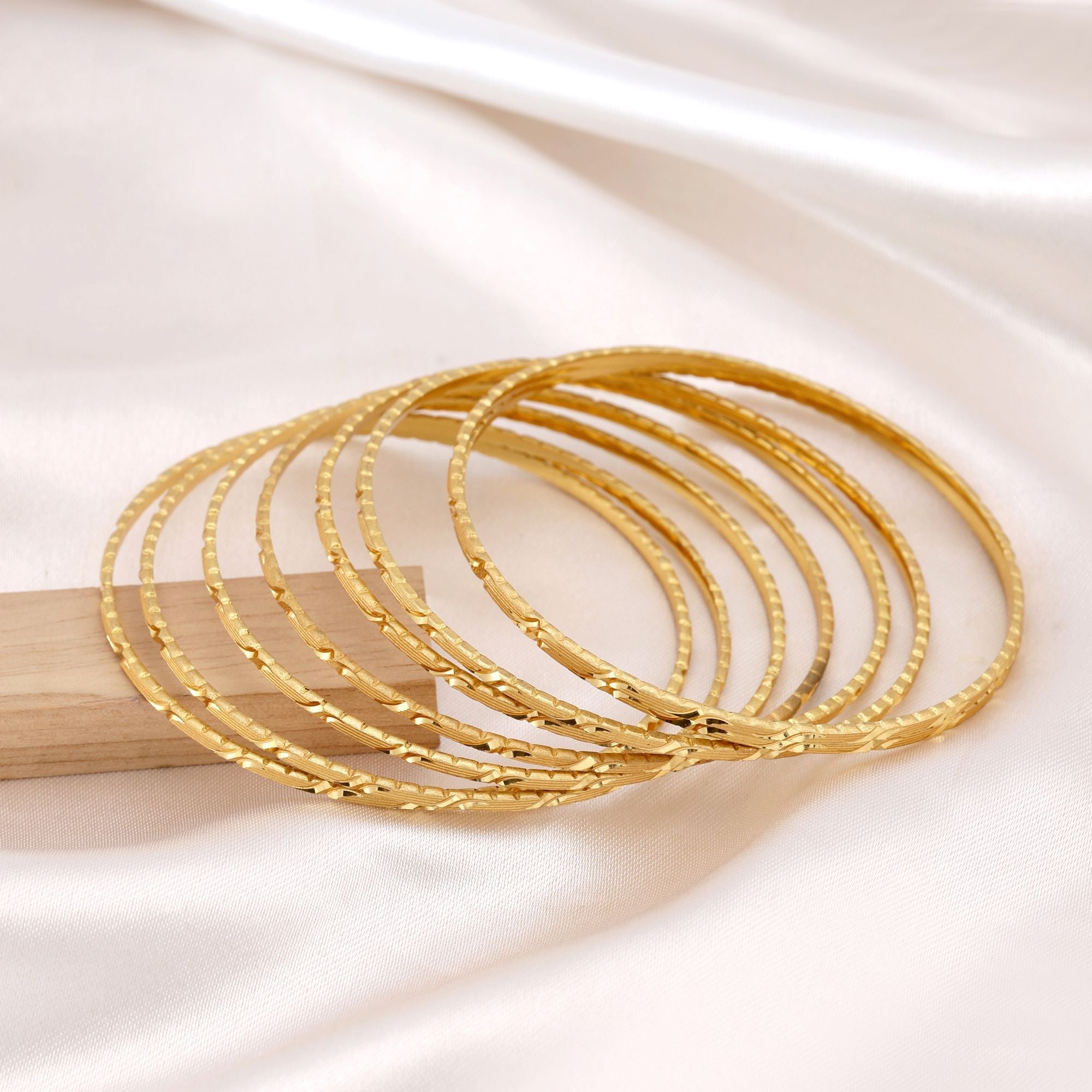 Gold Color 1 Set Of Fashion Bangle (PLKB130GLD)