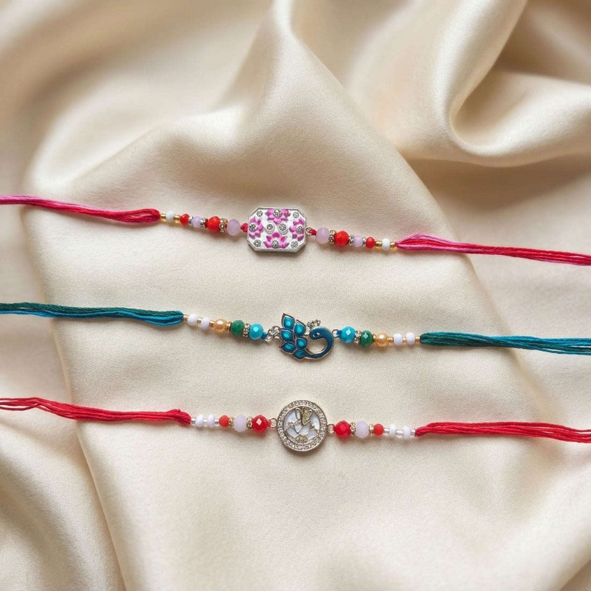 Multi Color Set of 3 Thread Rakhis Traditional Finish